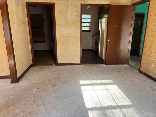 an empty room with windows