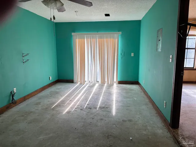 a view of a room that has a window in it