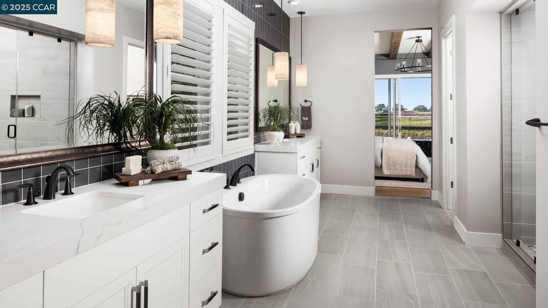 3172 Boca Way Tracy, CA 95377 - Photo 4 of 35 a bathroom with a sink a potted plant and a large mirror
