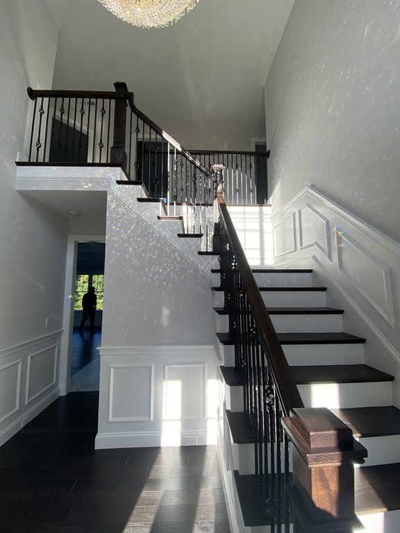 5 West River Street Upton, MA 01568 - Photo 2 of 37 a view of entryway and hall with wooden floor