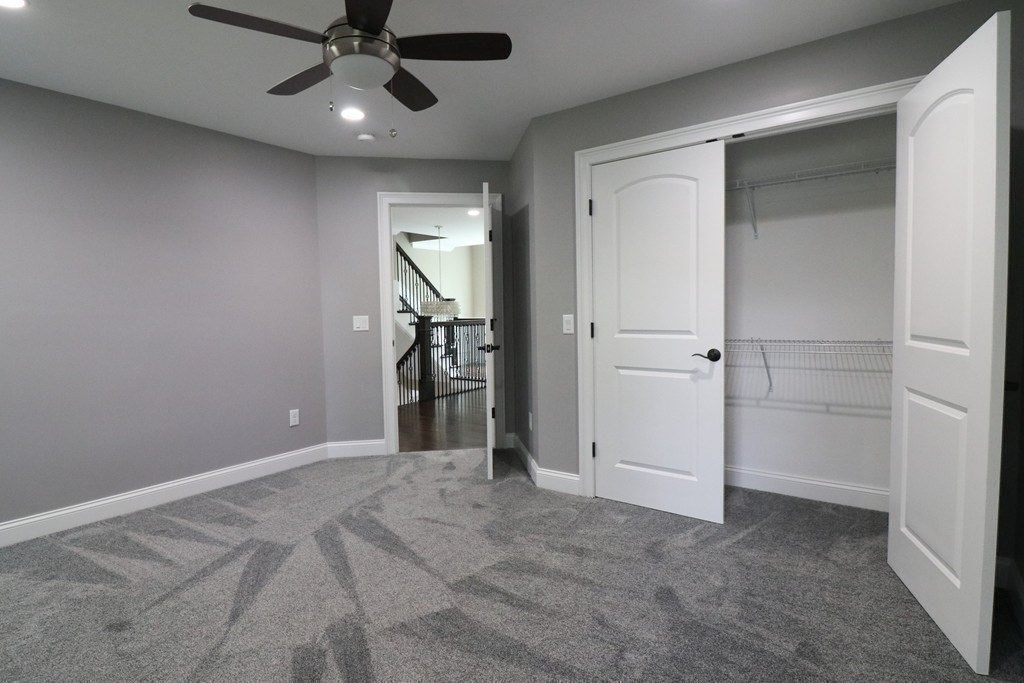 5 West River Street Upton, MA 01568 - Photo 25 of 37 a view of empty room with ceiling fan and window