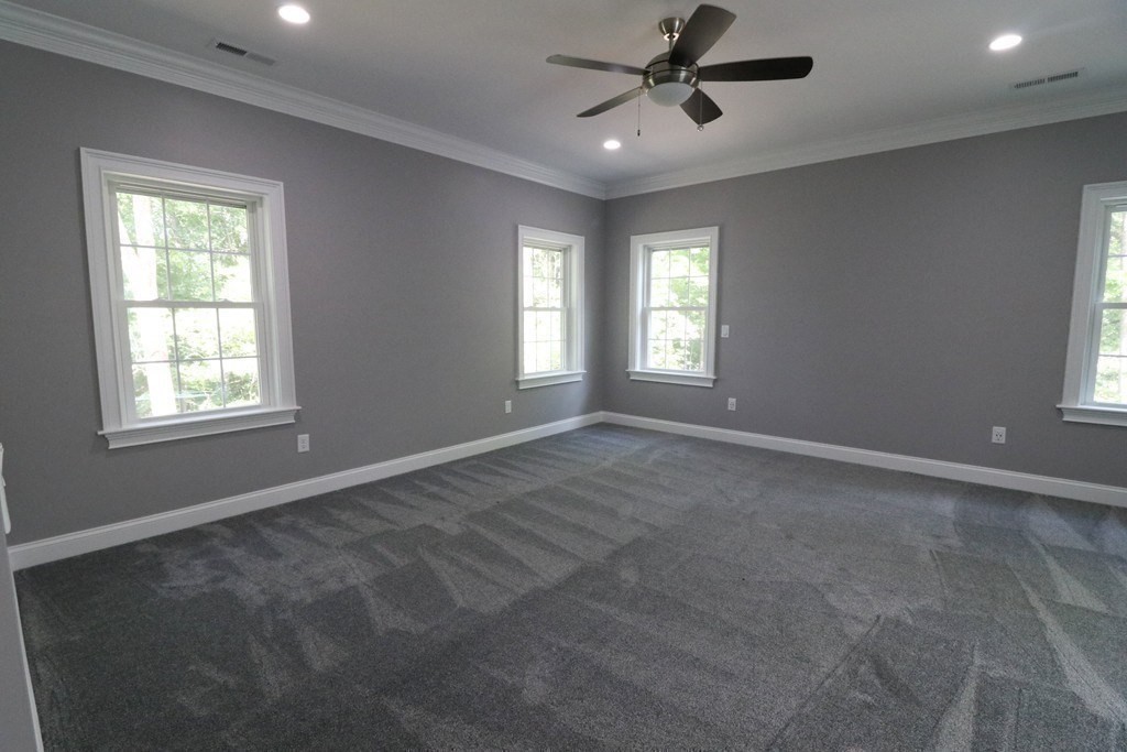 5 West River Street Upton, MA 01568 - Photo 32 of 37 a view of an empty room with a window