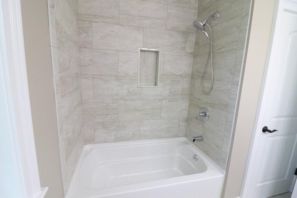 5 West River Street Upton, MA 01568 - Photo 33 of 37 a close view of a bathtub in bathroom