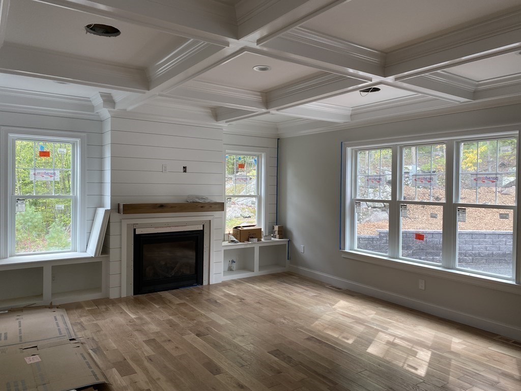 5 West River Street Upton, MA 01568 - Photo 36 of 37 a view of an empty room with a window and fireplace