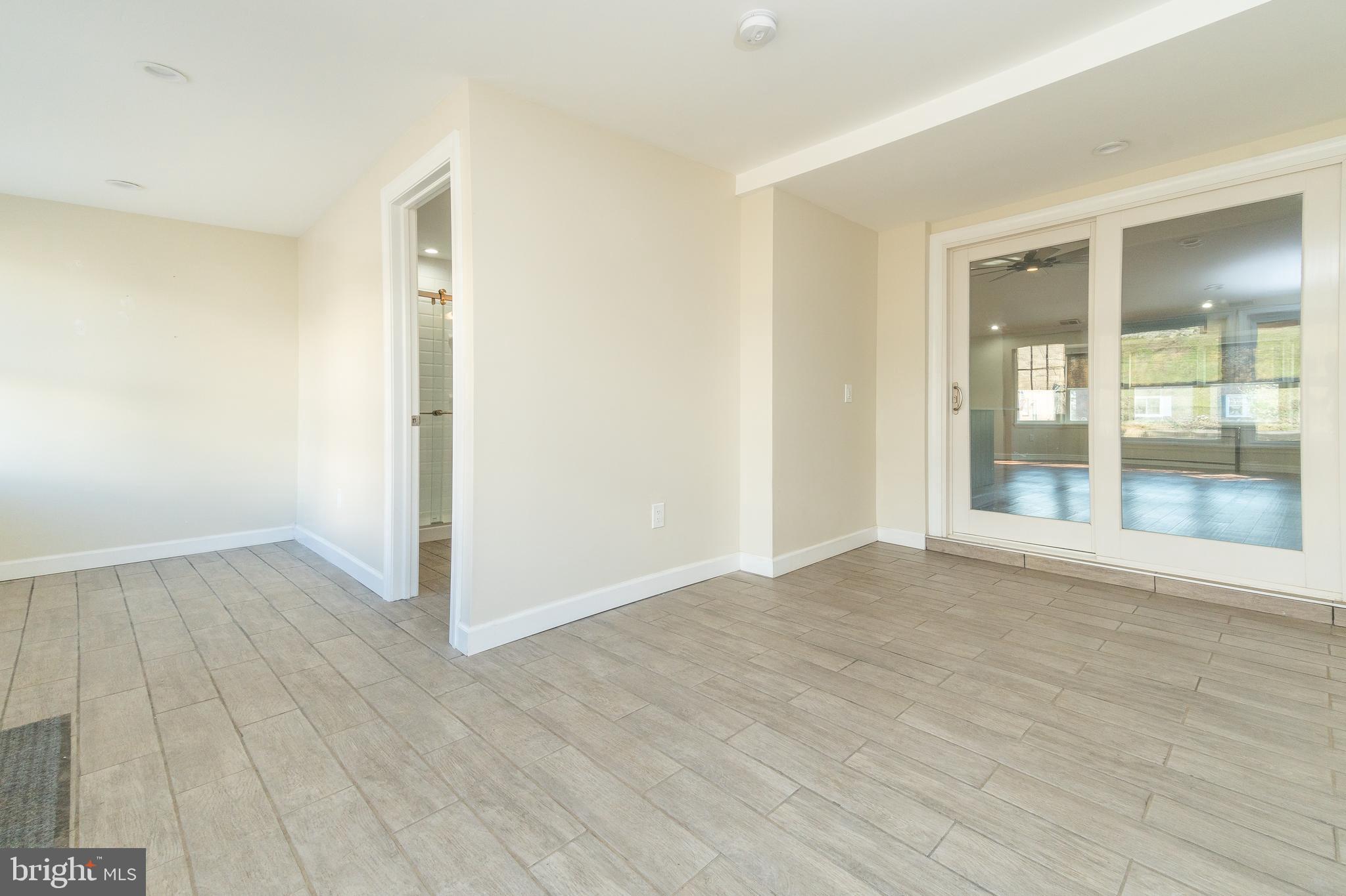 631 Renz Street Philadelphia, PA 19128 - Photo 26 of 40 Sunroom off of Kitchen