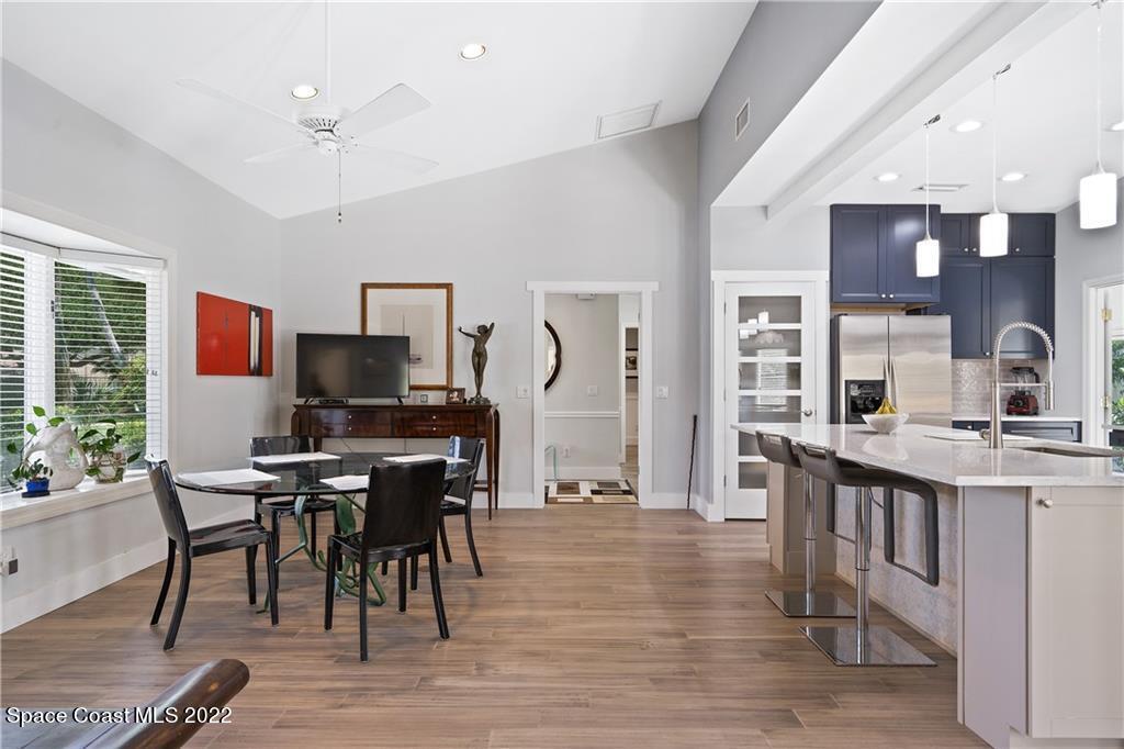 Undisclosed Address Vero Beach, FL 32963 - Photo 19 of 36 a view of a dining room with furniture window and wooden floor