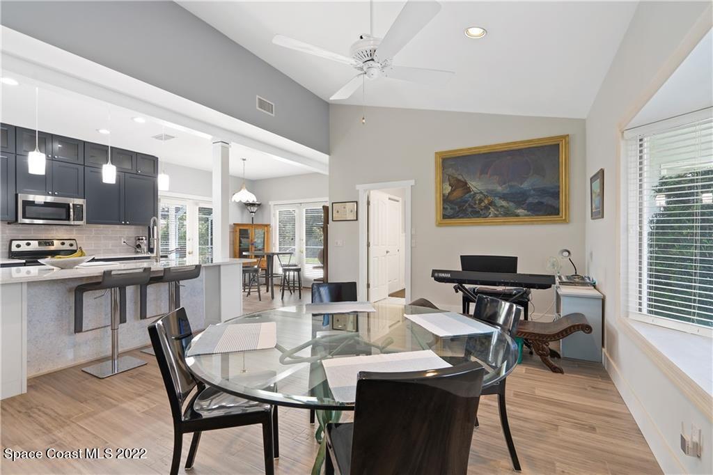 Undisclosed Address Vero Beach, FL 32963 - Photo 20 of 36 a view of a dining room with furniture window and wooden floor