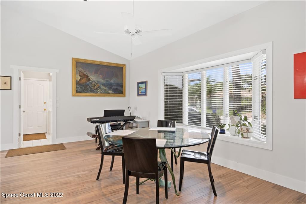 Undisclosed Address Vero Beach, FL 32963 - Photo 21 of 36 a view of a dining room with furniture window and wooden floor