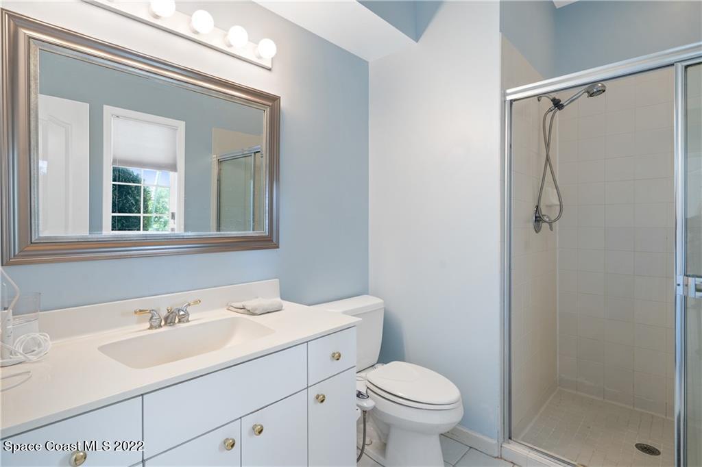 Undisclosed Address Vero Beach, FL 32963 - Photo 26 of 36 a bathroom with a sink toilet and shower