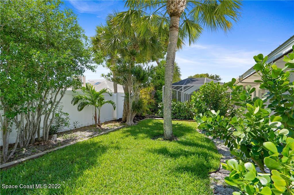 Undisclosed Address Vero Beach, FL 32963 - Photo 33 of 36 a view of a garden with a tree