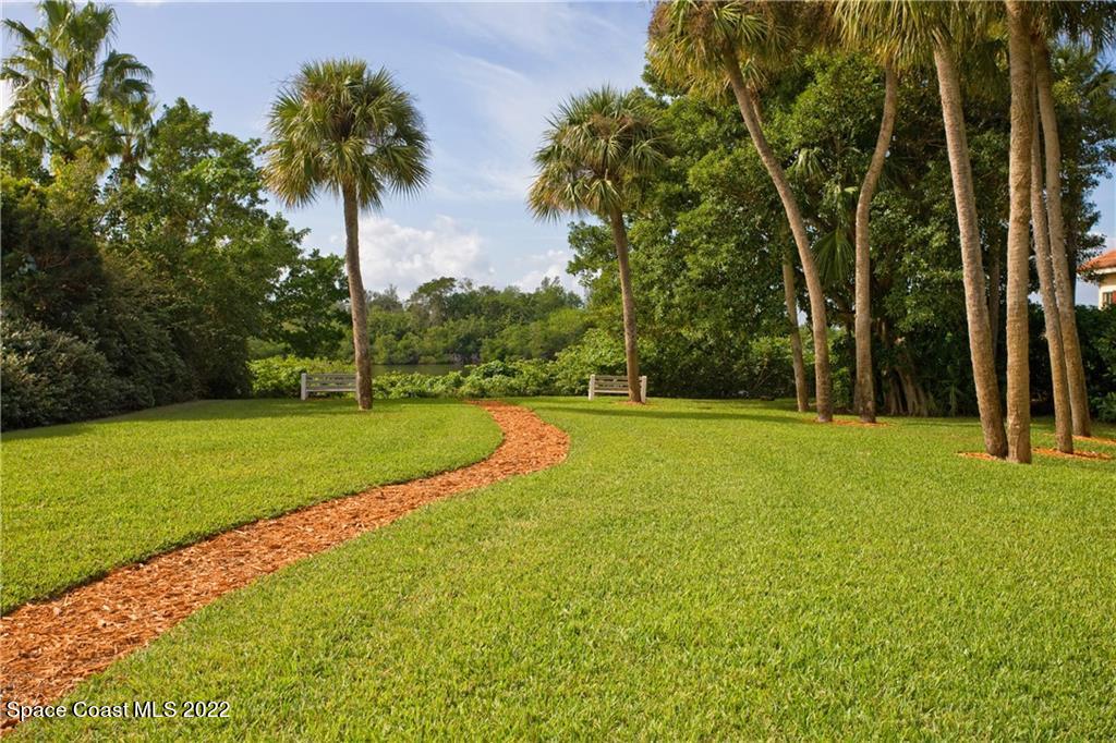 Undisclosed Address Vero Beach, FL 32963 - Photo 34 of 36 a view of a swimming pool with a yard
