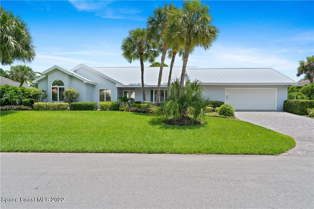 Undisclosed Address Vero Beach, FL 32963 - Photo 36 of 36 a house with a garden in front of it