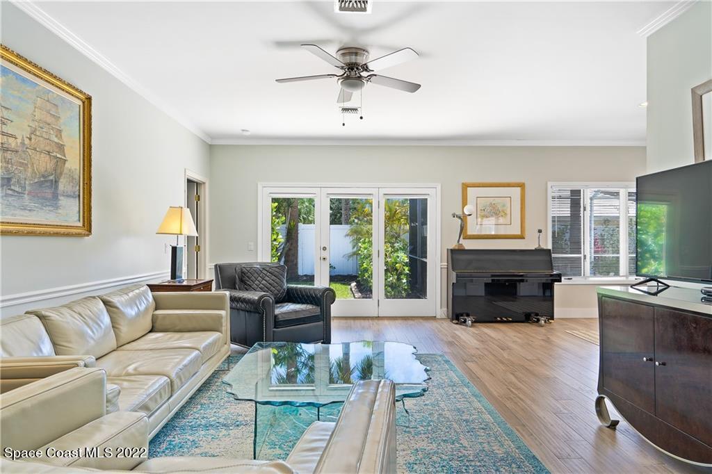 Undisclosed Address Vero Beach, FL 32963 - Photo 5 of 36 a living room with furniture fireplace and a flat screen tv