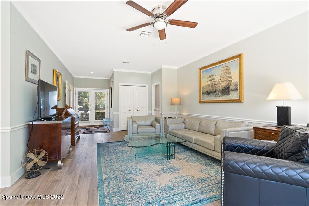 Undisclosed Address Vero Beach, FL 32963 - Photo 6 of 36 a living room with furniture and a flat screen tv