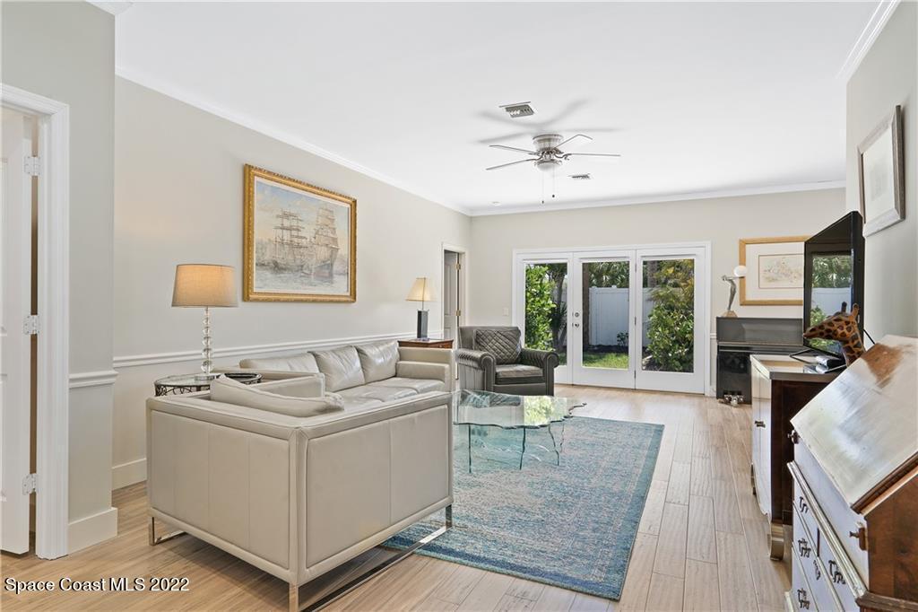 Undisclosed Address Vero Beach, FL 32963 - Photo 7 of 36 a living room with furniture and a flat screen tv