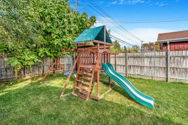 a view of outdoor space with a swimming pool