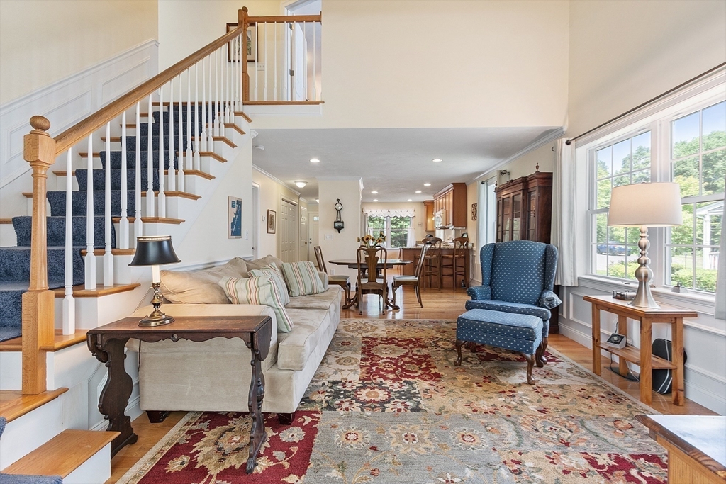 19 Marble Farm Road, Unit 19 Maynard, MA 01754 - Photo 11 of 42 a living room with furniture and a piano