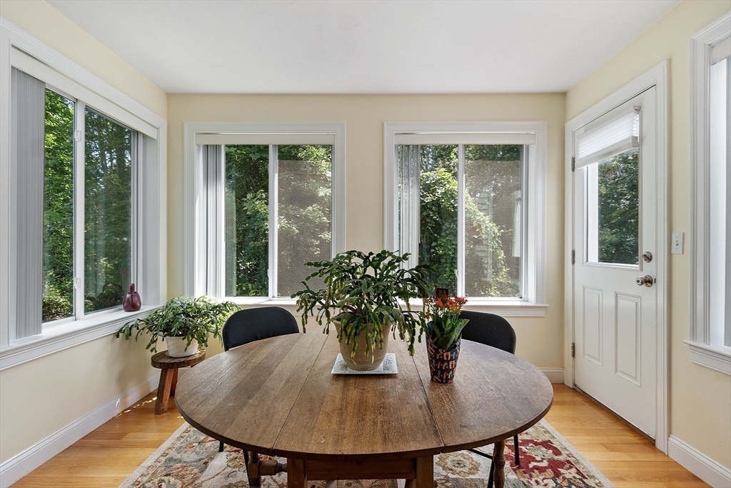 19 Marble Farm Road, Unit 19 Maynard, MA 01754 - Photo 13 of 42 a dining room with furniture window and wooden floor