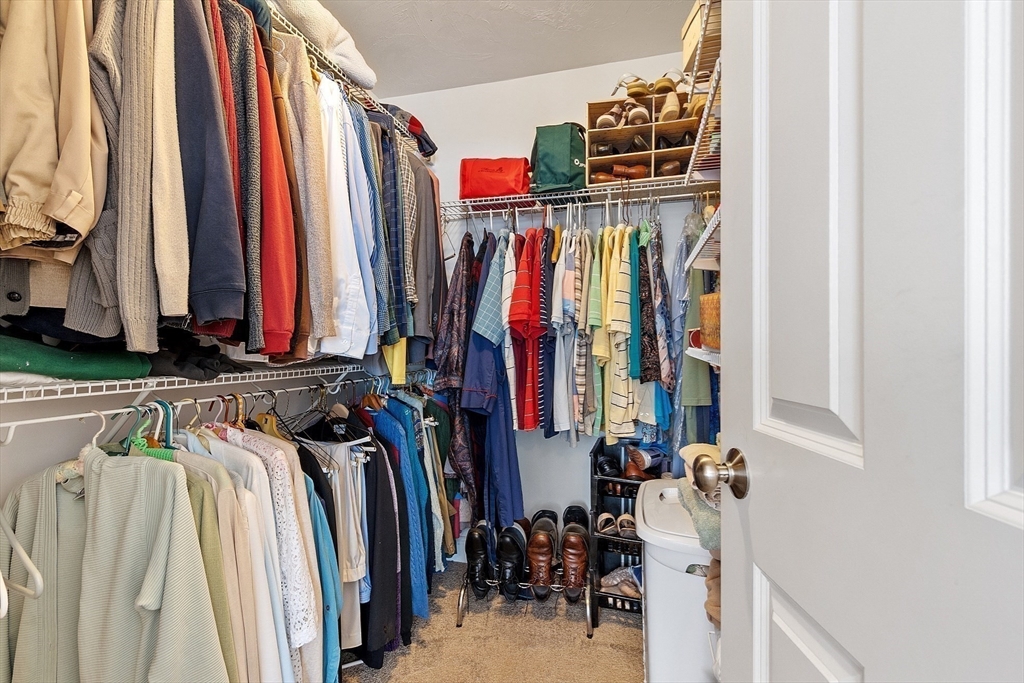 19 Marble Farm Road, Unit 19 Maynard, MA 01754 - Photo 17 of 42 a view of walk in closet with clothes