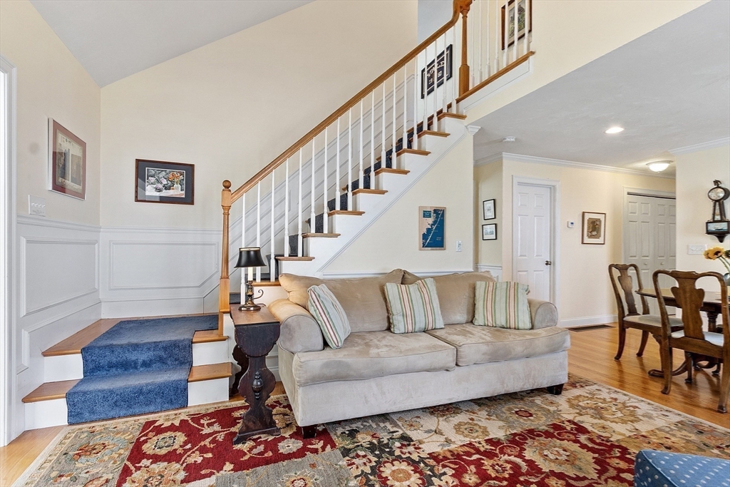 19 Marble Farm Road, Unit 19 Maynard, MA 01754 - Photo 20 of 42 a living room with furniture and wooden floor