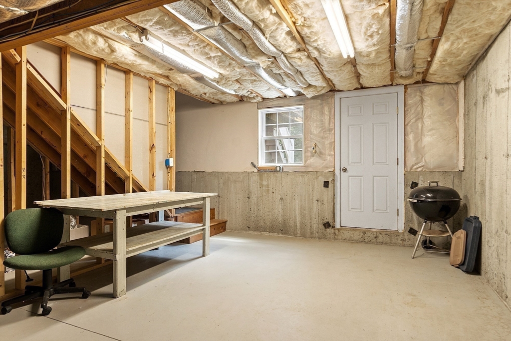 19 Marble Farm Road, Unit 19 Maynard, MA 01754 - Photo 30 of 42 a view of room with furniture and windows