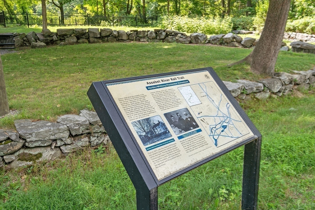 19 Marble Farm Road, Unit 19 Maynard, MA 01754 - Photo 36 of 42 a view of a yard with table and chairs