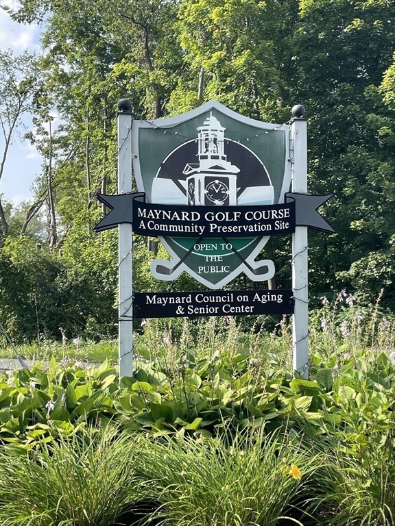 19 Marble Farm Road, Unit 19 Maynard, MA 01754 - Photo 42 of 42 a sign that is sitting on a small yard