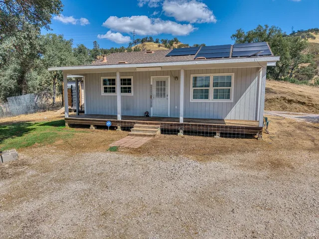 front view of a house with yard