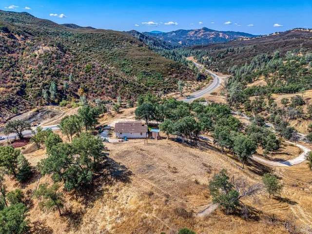 a view of a houses with a yard