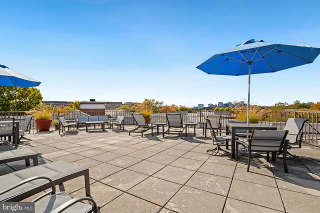 a view of a terrace with furniture