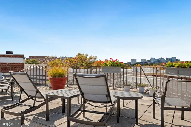 a view of a chairs and table on the terrace