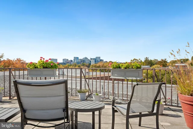a view of a chairs and table on the terrace