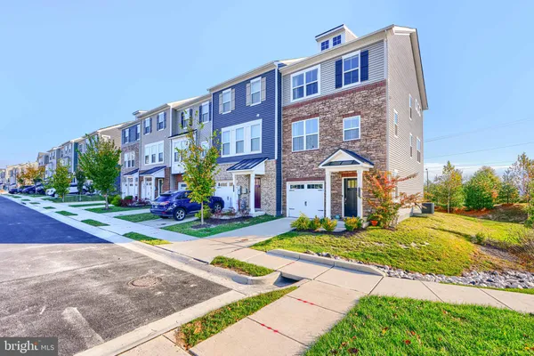 a view of a building with a yard