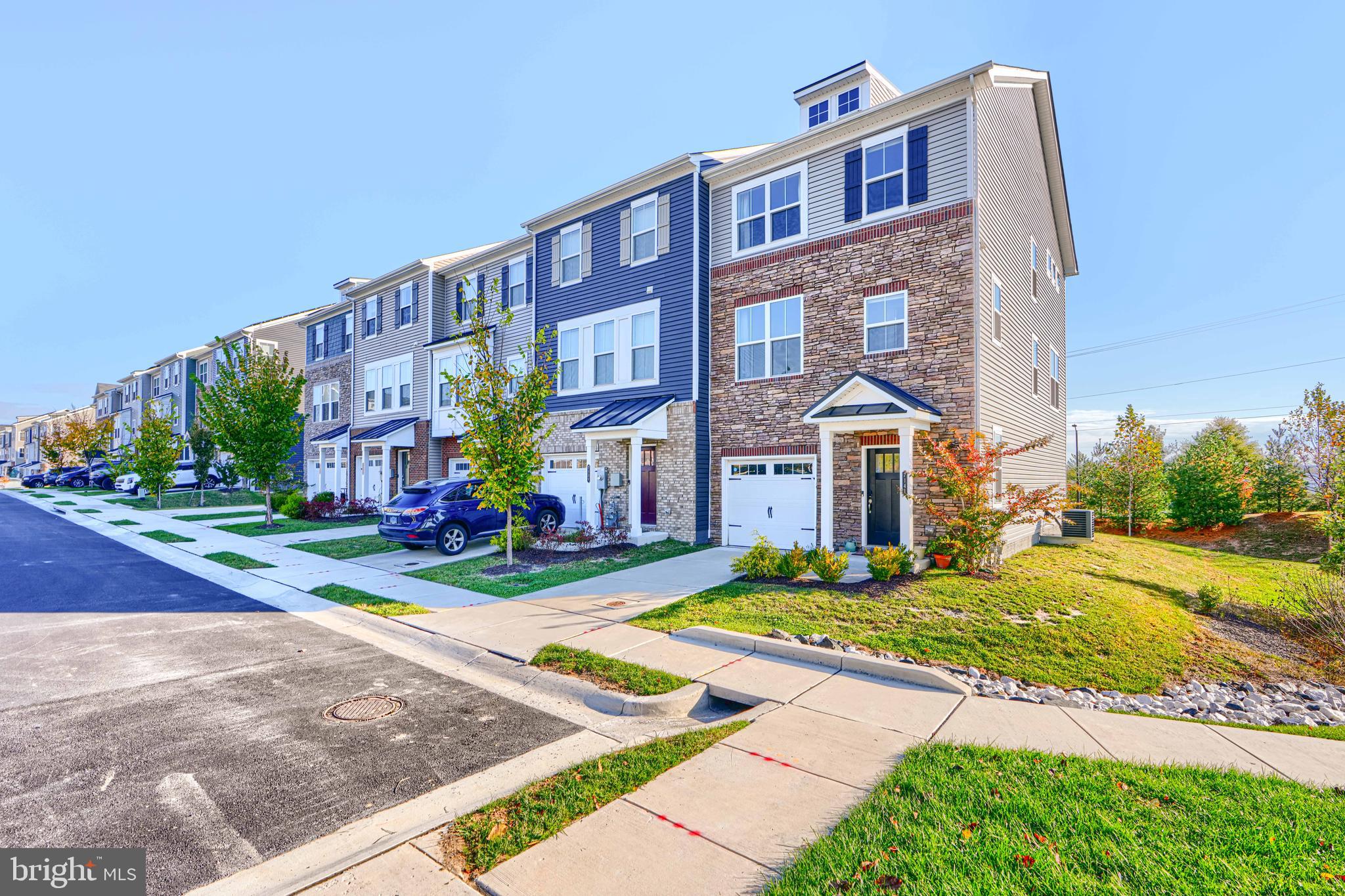 7141 Millstone Road Hanover, MD 21076 - Photo 1 of 32 a view of a building with a yard