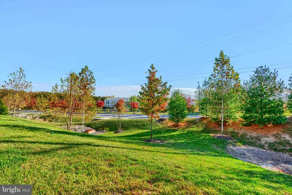 a view of a golf course with a lake