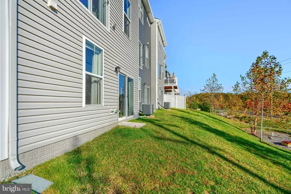 a view of a backyard with plants
