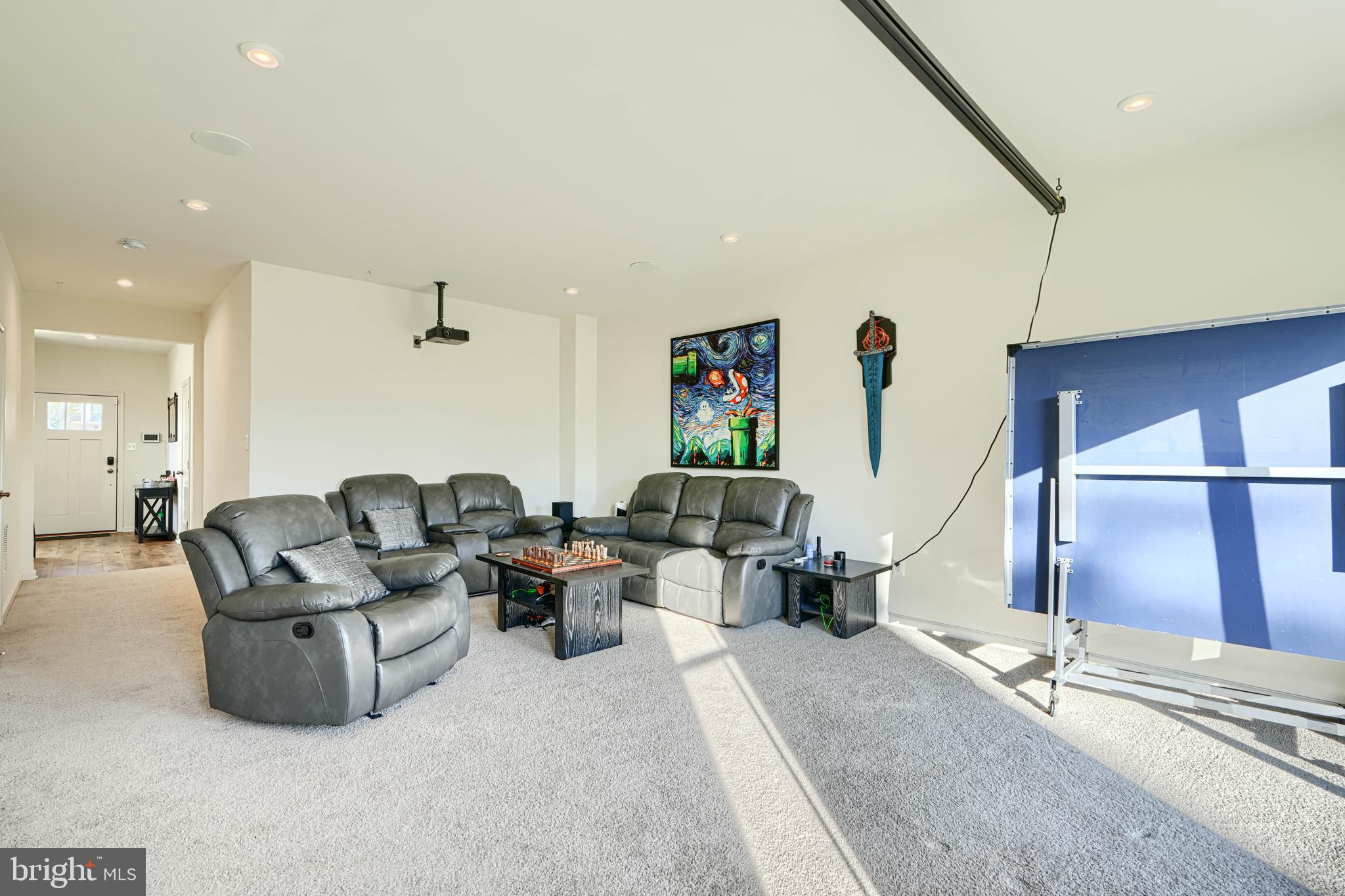 7141 Millstone Road Hanover, MD 21076 - Photo 7 of 32 a living room with furniture