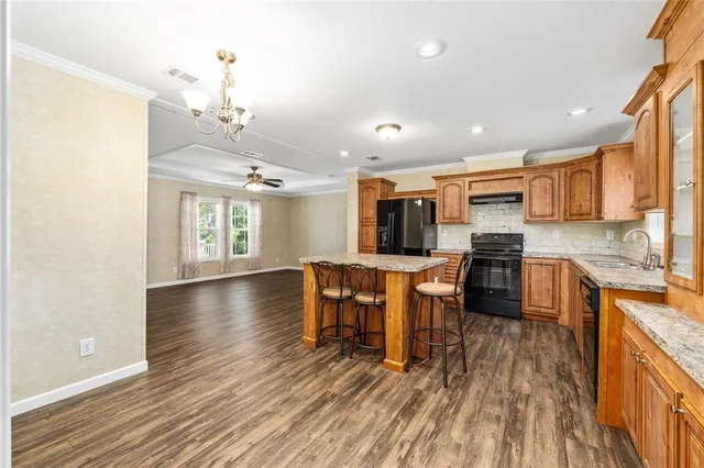 a view of a bathroom with a shower and a sink