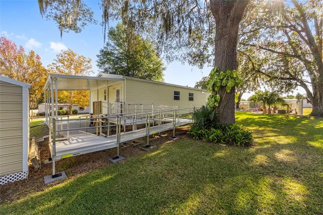 an aerial view of residential houses with city view