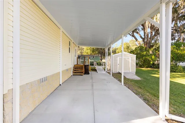 a view of a porch with garden