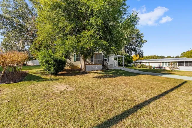 a balcony view with a outdoor seating