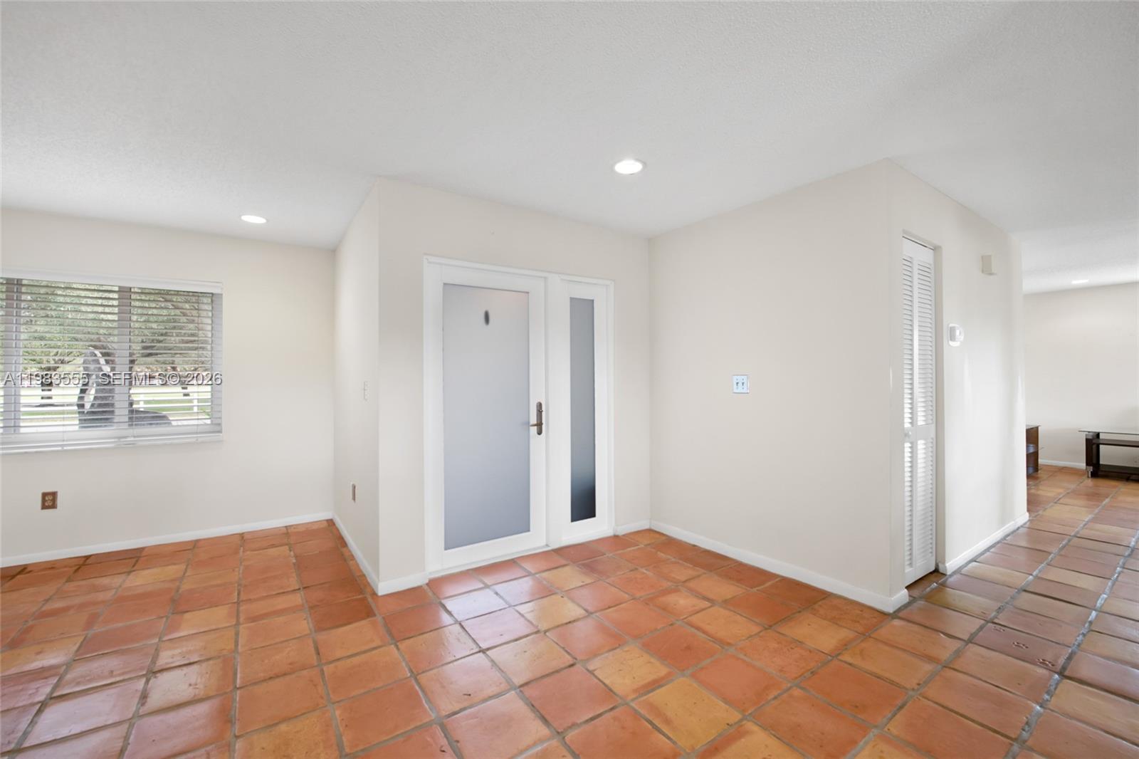 5757 Southwest 113th Avenue Cooper City, FL 33330 - Photo 12 of 48 a view of a big room with windows and closet