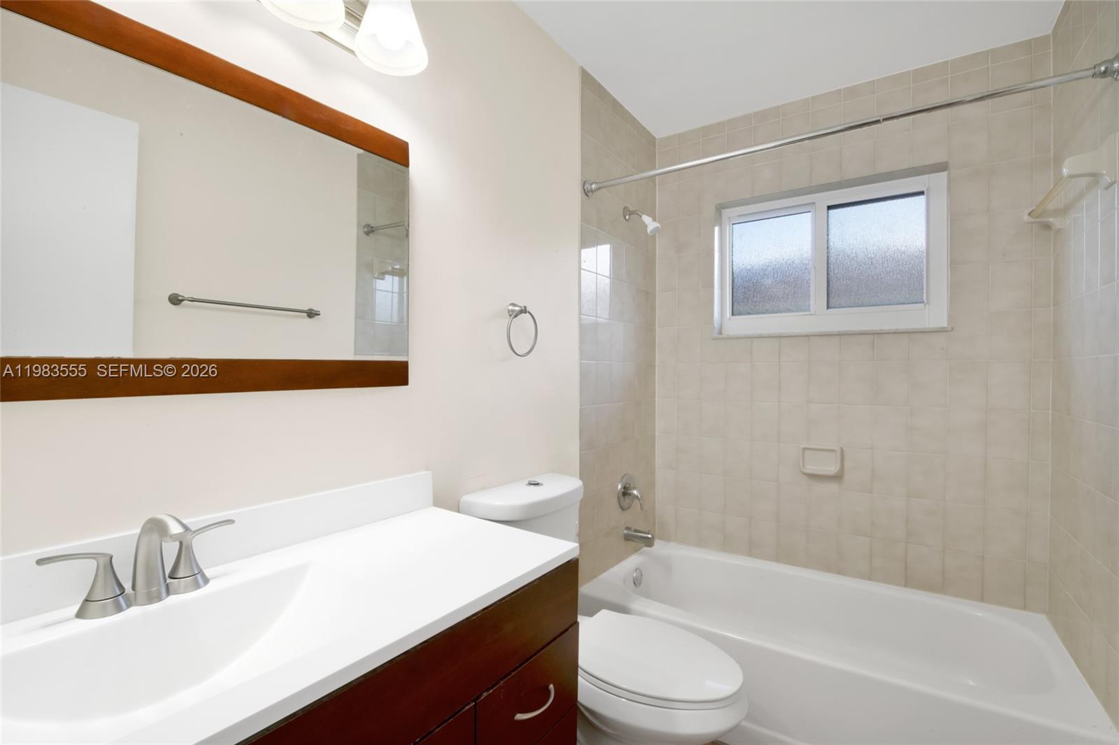 5757 Southwest 113th Avenue Cooper City, FL 33330 - Photo 25 of 48 a bathroom with a sink a toilet and shower