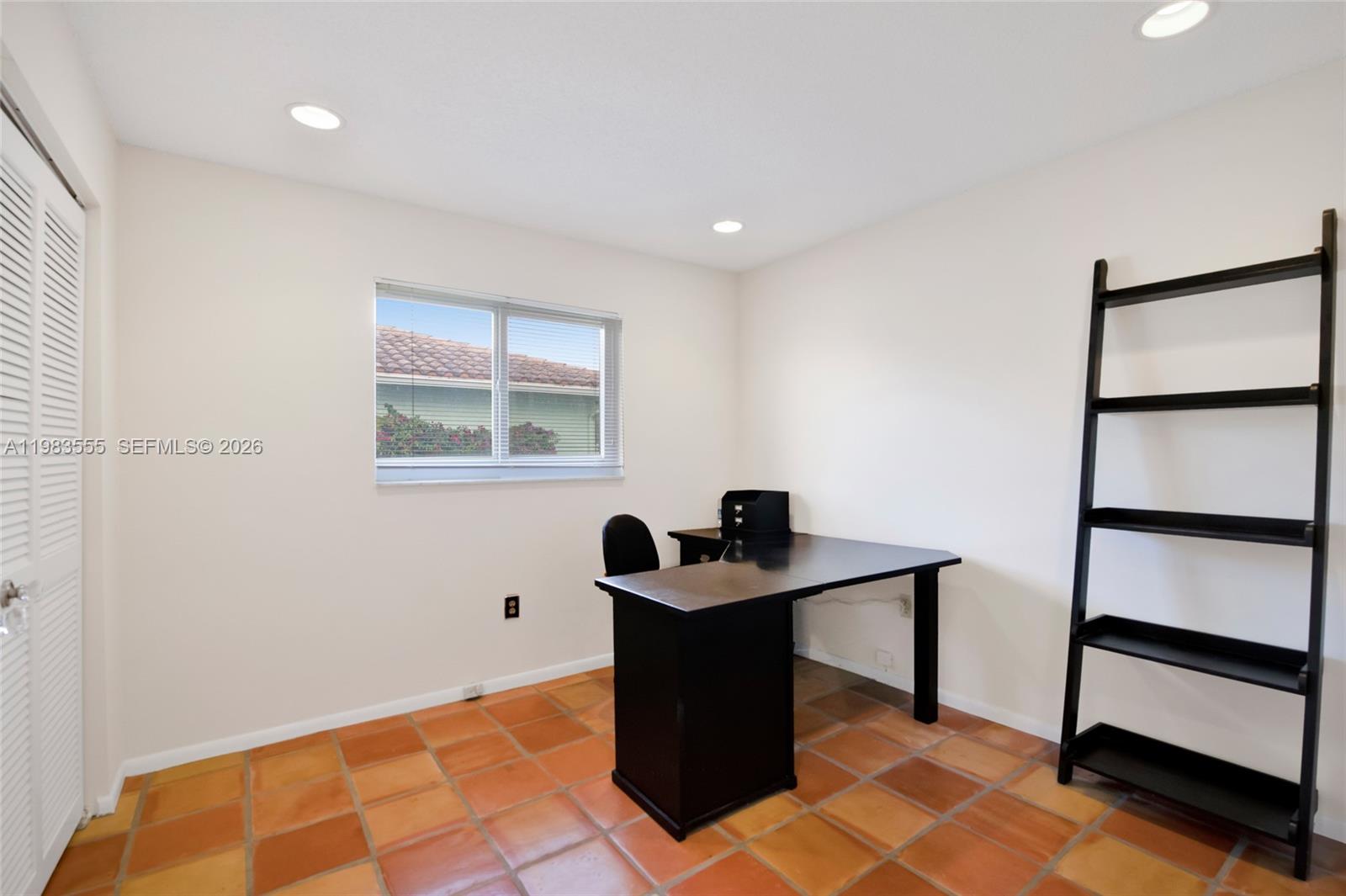5757 Southwest 113th Avenue Cooper City, FL 33330 - Photo 26 of 48 a view of a workspace with furniture and window