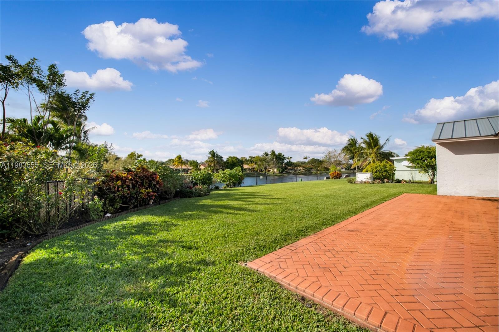 5757 Southwest 113th Avenue Cooper City, FL 33330 - Photo 30 of 48 a view of a golf course with a yard