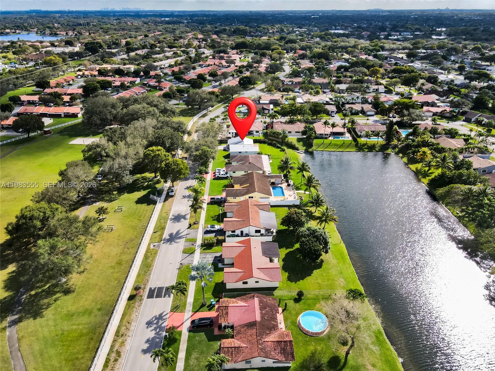 5757 Southwest 113th Avenue Cooper City, FL 33330 - Photo 3 of 48 an aerial view of residential houses with outdoor space