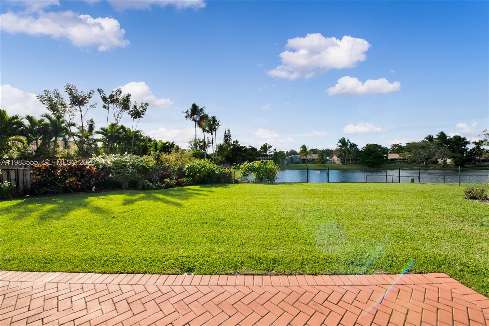 5757 Southwest 113th Avenue Cooper City, FL 33330 - Photo 36 of 48 a view of a golf course with a lake