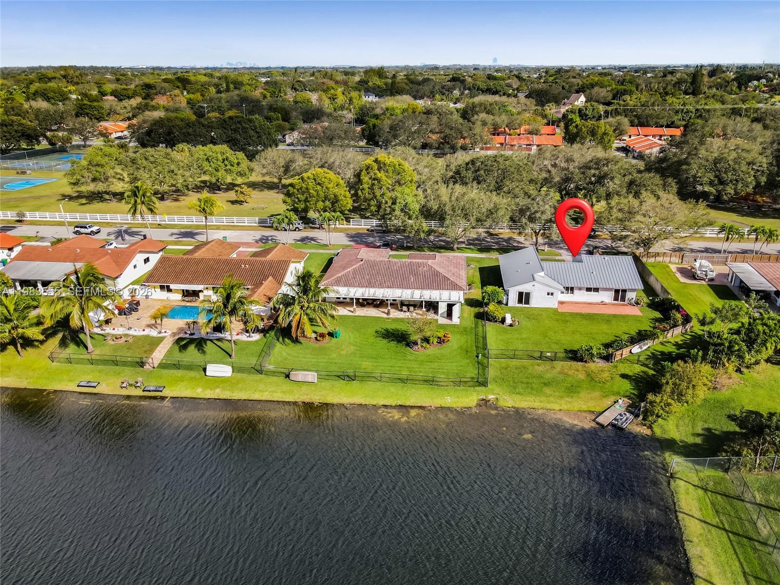 5757 Southwest 113th Avenue Cooper City, FL 33330 - Photo 40 of 48 an aerial view of residential houses with outdoor space
