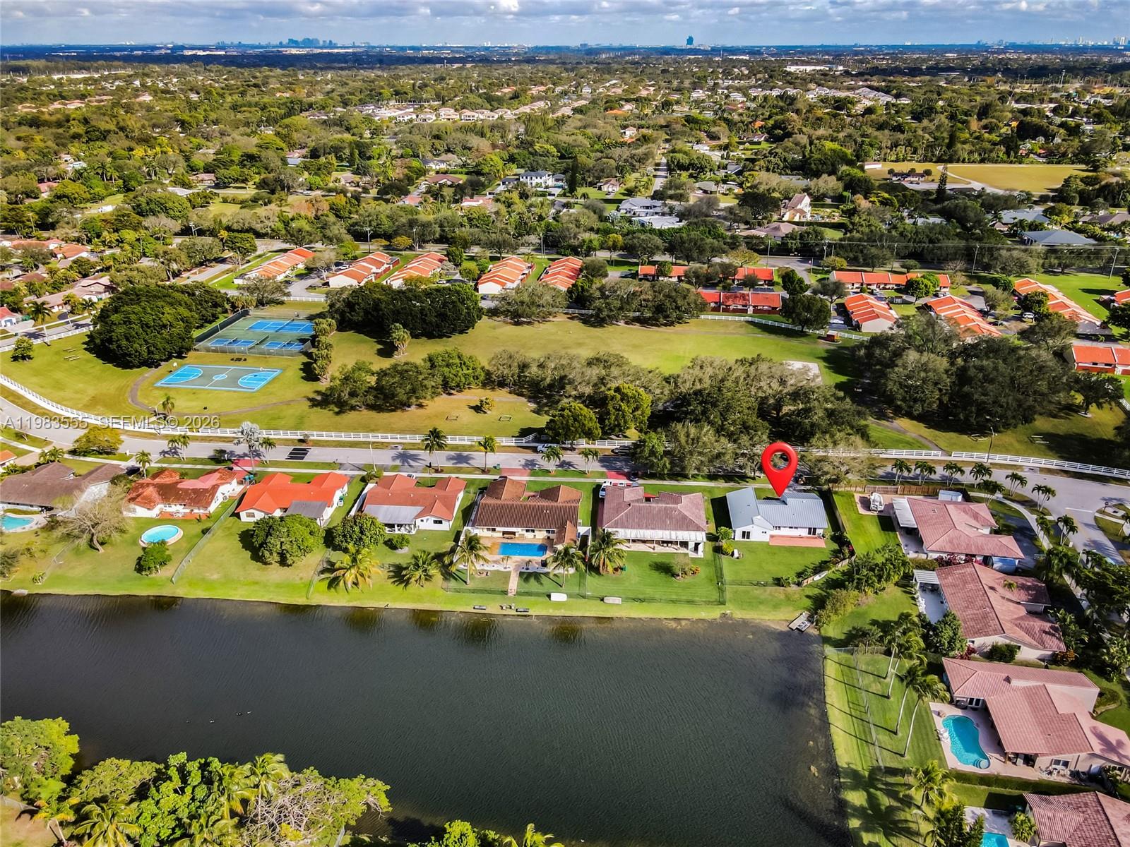 5757 Southwest 113th Avenue Cooper City, FL 33330 - Photo 41 of 48 an aerial view of a houses with a lake view