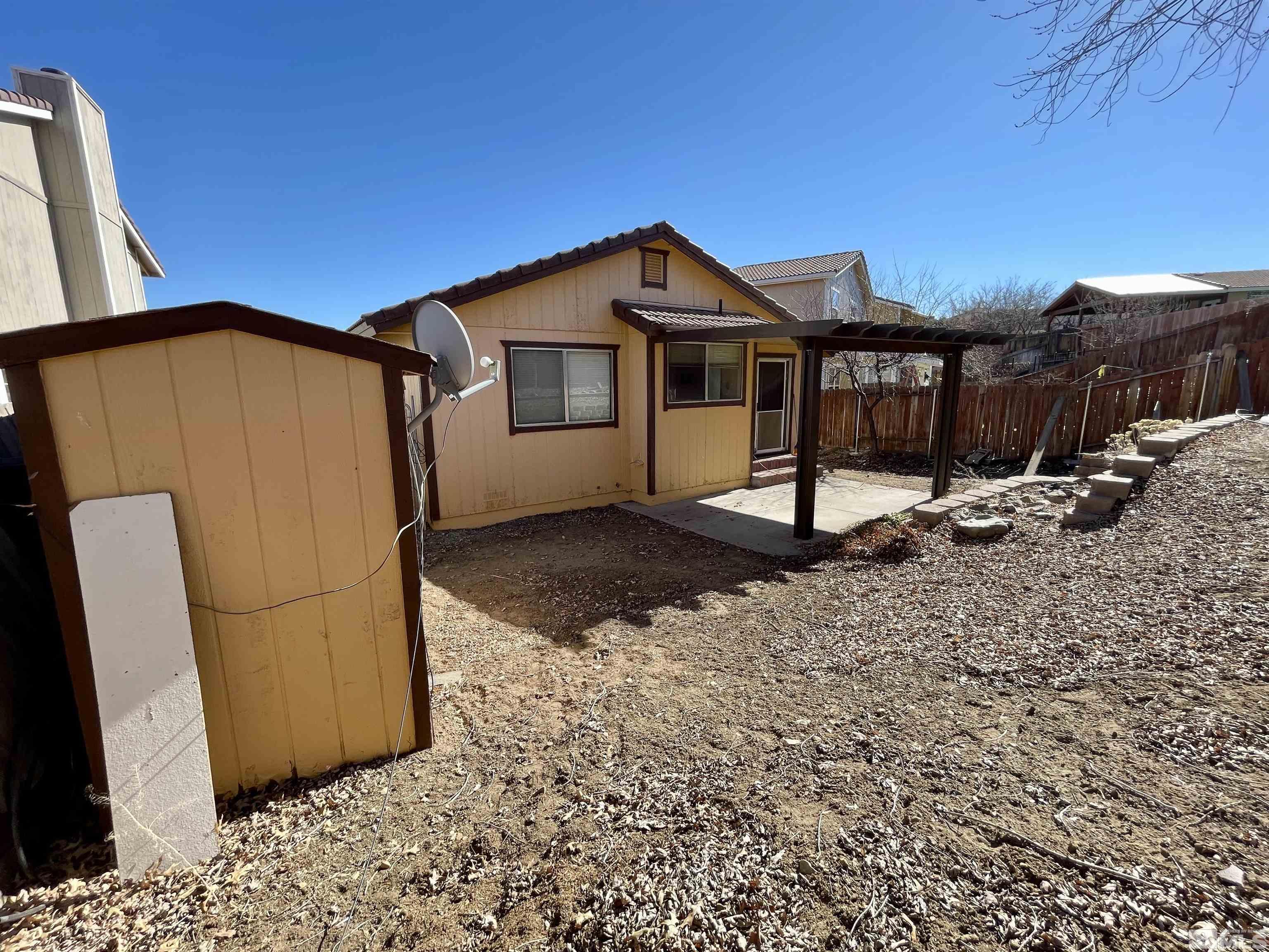 6930 Flower Street Reno, NV 89506 - Photo 19 of 19 a view of a house with backyard